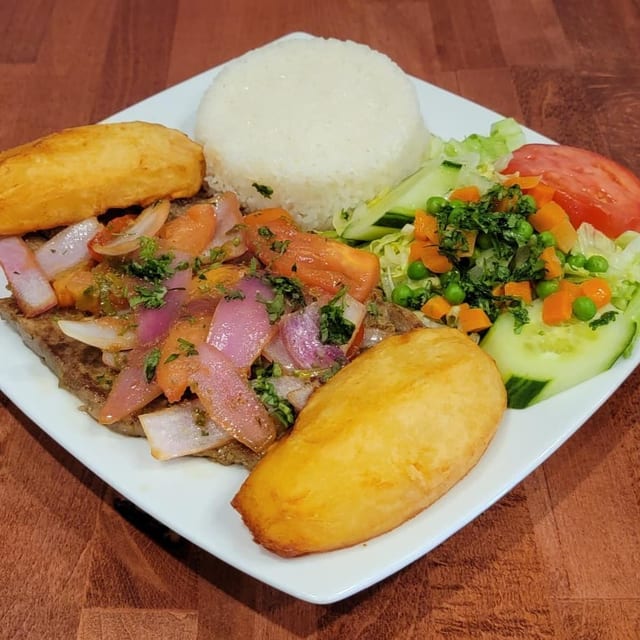 Bistec Encebollado.