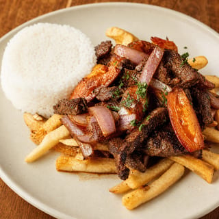 Lomo Saltado De Pollo O Carne